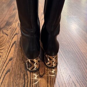 Elegant Black Leather Boots with Gold Accents